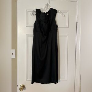 Satin, knee length cocktail dress. Warn once